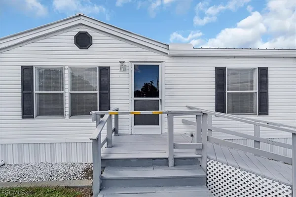 a view of a house with a large window