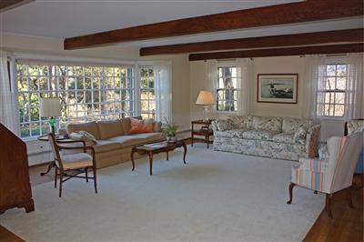 127 Old Salt Works Road Chatham, MA 02633 - Photo 5 of 10 a living room with furniture and a large window