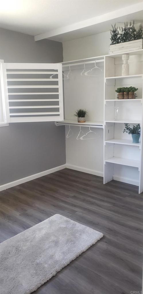 3011 Thunder Drive Oceanside, CA 92056 - Photo 15 of 28 a view of a room with wooden floor and a window