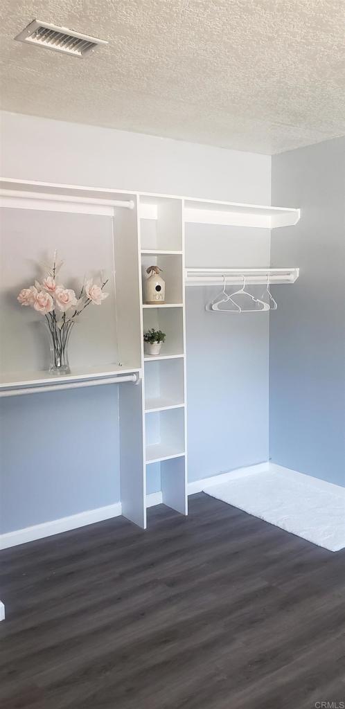 3011 Thunder Drive Oceanside, CA 92056 - Photo 17 of 28 a view of a room with wooden floor