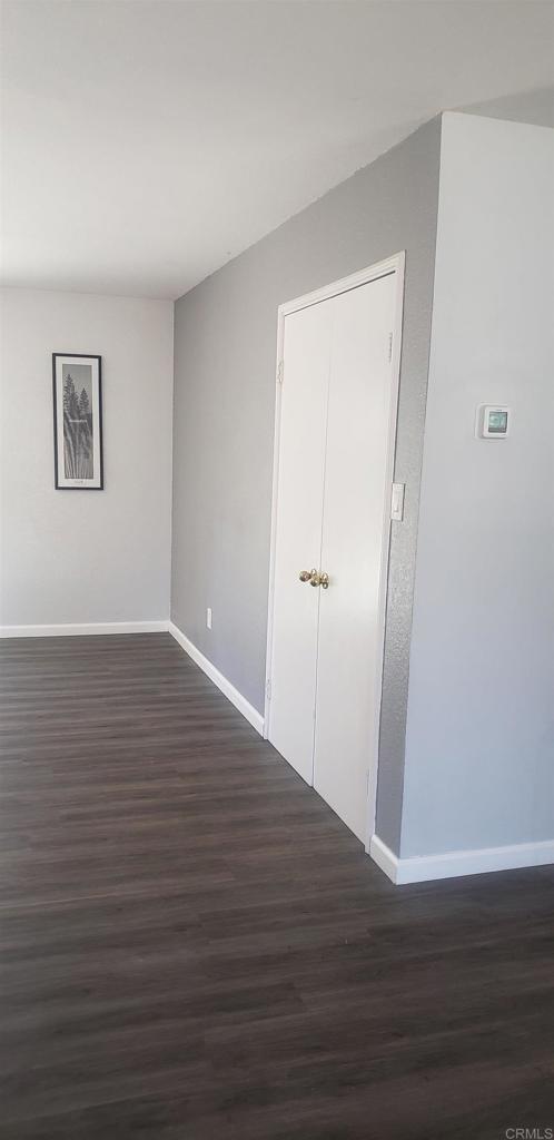 3011 Thunder Drive Oceanside, CA 92056 - Photo 19 of 28 a view of a room with wooden floor