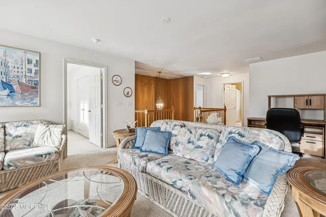 a living room with furniture and a couch