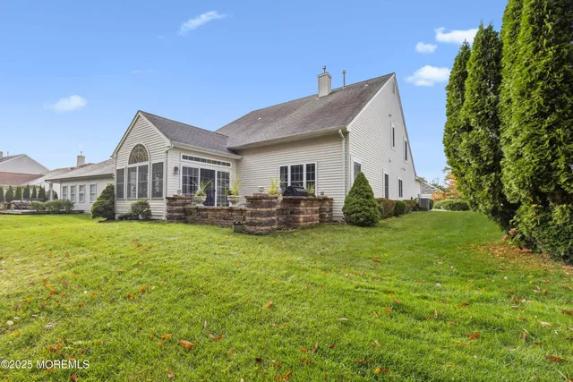 a view of a house with a big yard