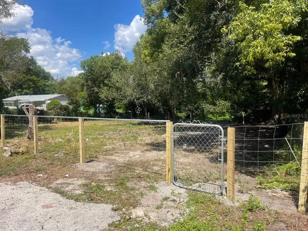 a view of a wooden fence