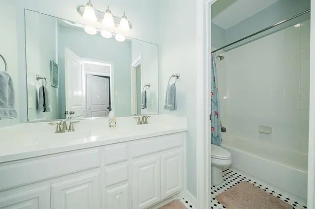 a playing room with toys and a baby crib