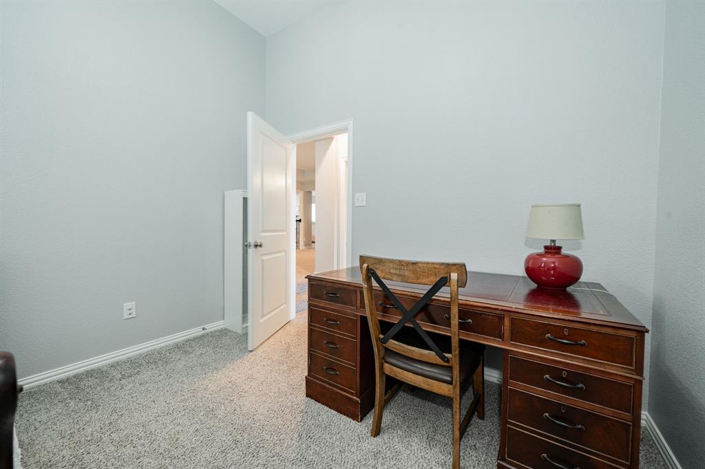 2023 Cutter Crossing Place Wylie, TX 75098 - Photo 12 of 33 a room with furniture and a potted plant