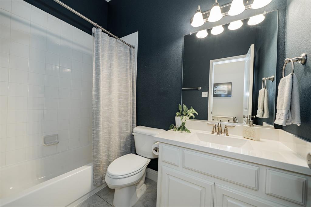 2023 Cutter Crossing Place Wylie, TX 75098 - Photo 19 of 33 a bathroom with a sink toilet and shower