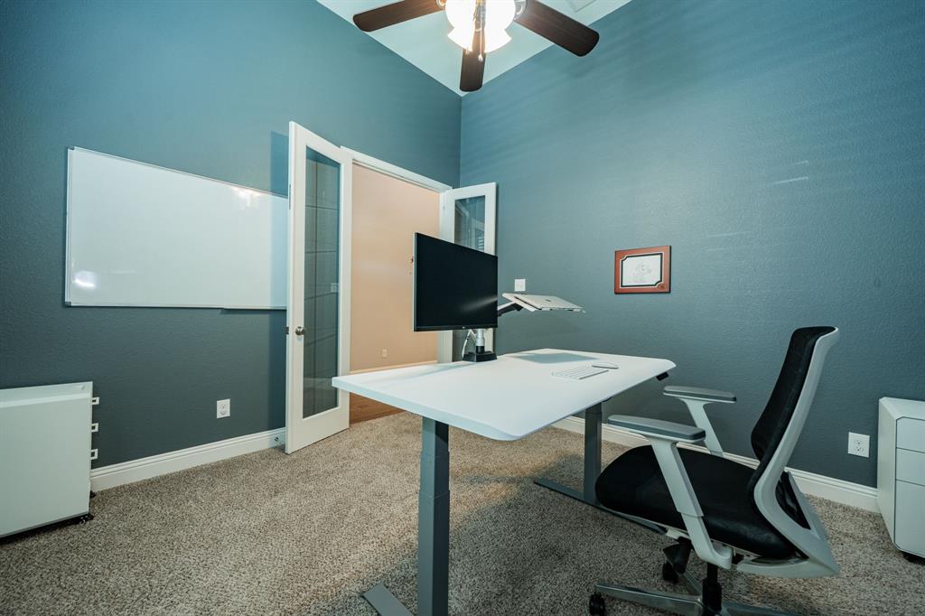 2023 Cutter Crossing Place Wylie, TX 75098 - Photo 30 of 33 a view of a workspace with furniture