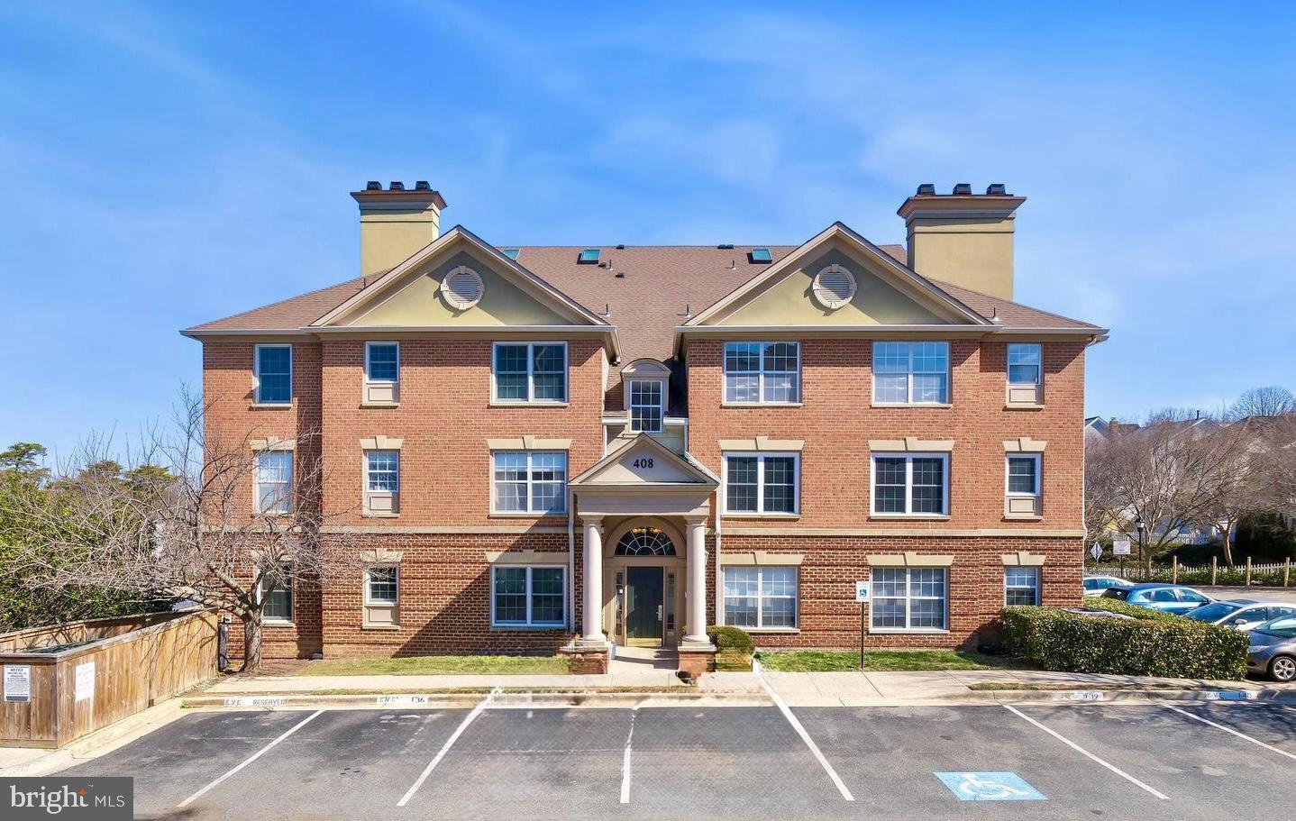 408 Ridgepoint Place, Unit 40838 Gaithersburg, MD 20878 - Photo 1 of 38 Charming brick apartment building.
