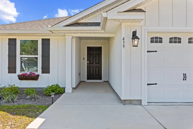 a front view of a house with yard