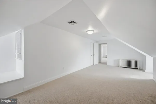 a view of a livingroom with a staircase