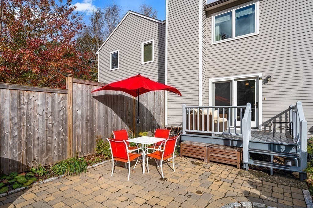 37 Murray Road, Unit 37 Newton, MA 02465 - Photo 19 of 33 a patio with table and chairs