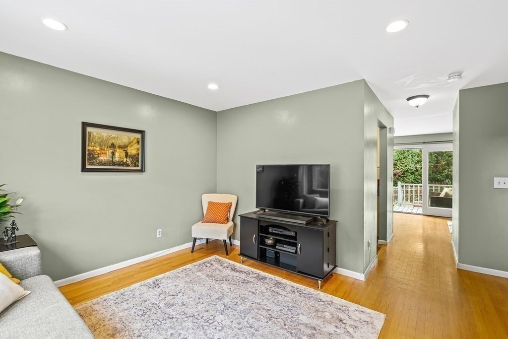 37 Murray Road, Unit 37 Newton, MA 02465 - Photo 5 of 33 a living room with furniture and a flat screen tv