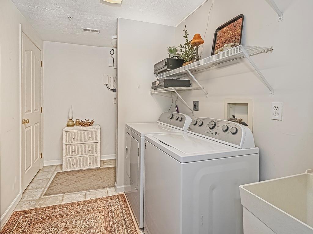 210 Adams Pointe Boulevard, Unit 6 Mars, PA 16046 - Photo 17 of 35 a utility room with dryer and washer