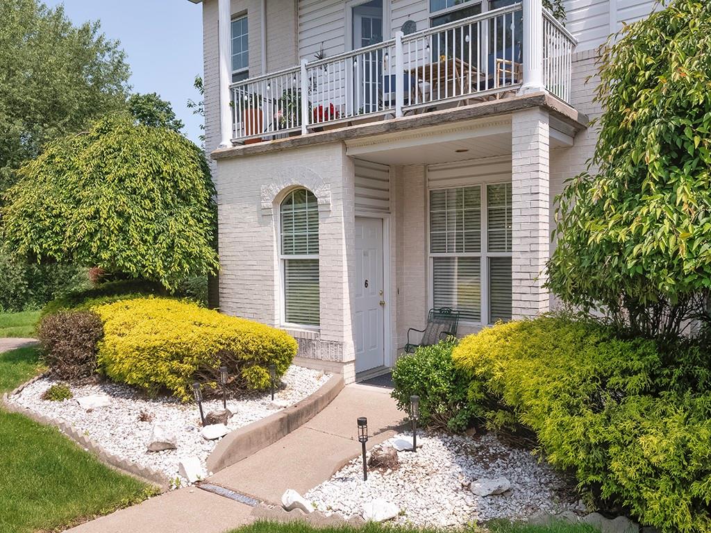 210 Adams Pointe Boulevard, Unit 6 Mars, PA 16046 - Photo 2 of 35 a view of a backyard with pathway