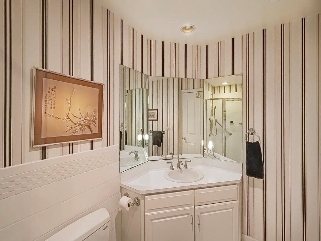 210 Adams Pointe Boulevard, Unit 6 Mars, PA 16046 - Photo 25 of 35 a bathroom with a sink and a mirror