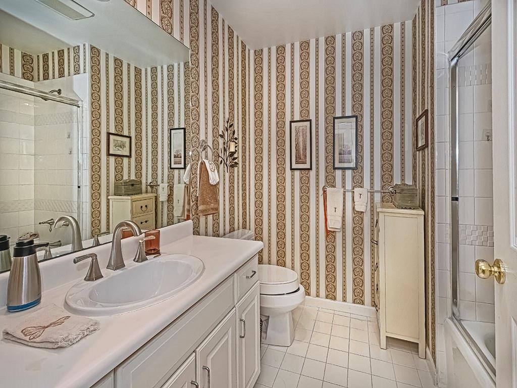 210 Adams Pointe Boulevard, Unit 6 Mars, PA 16046 - Photo 27 of 35 a bathroom with a sink a toilet and shower