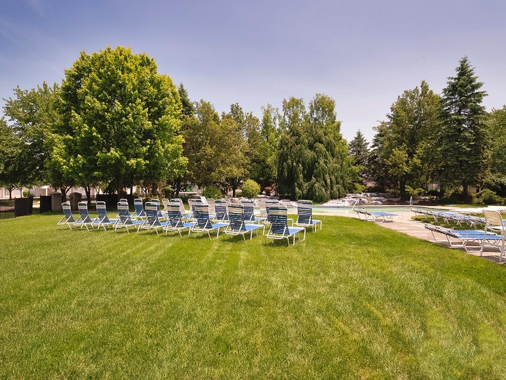 210 Adams Pointe Boulevard, Unit 6 Mars, PA 16046 - Photo 30 of 35 a swimming pool with outdoor seating and yard