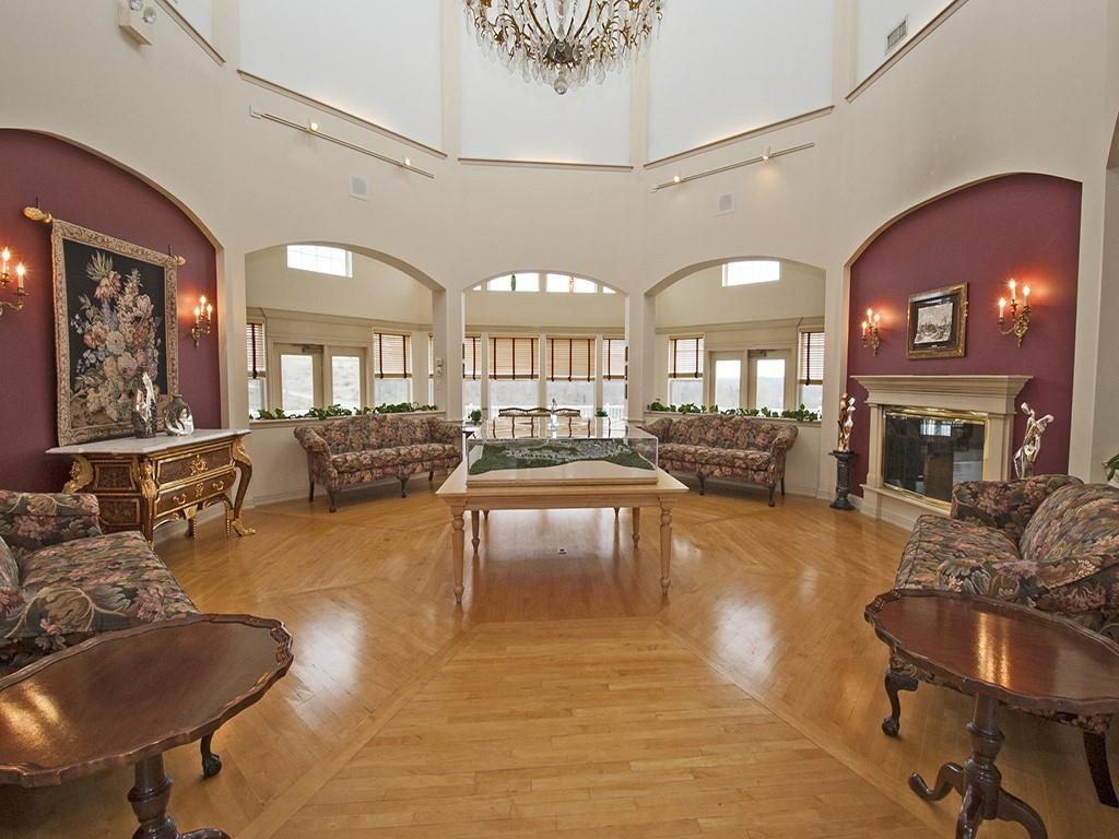 210 Adams Pointe Boulevard, Unit 6 Mars, PA 16046 - Photo 34 of 35 a living room with fireplace furniture and a fireplace