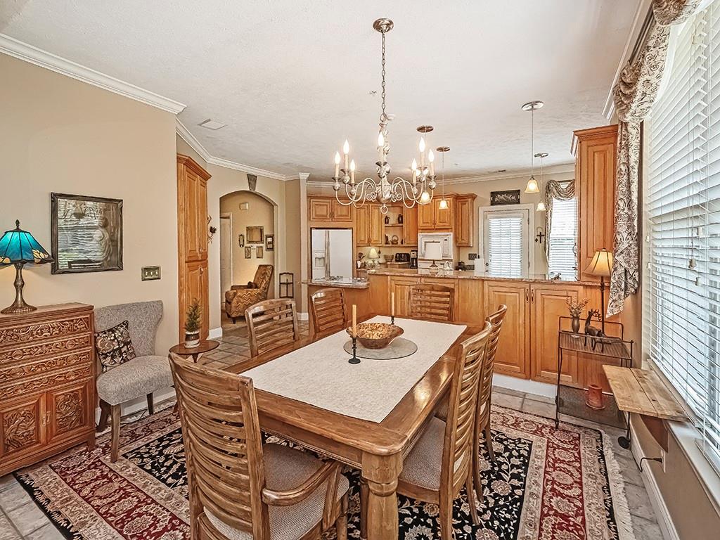 210 Adams Pointe Boulevard, Unit 6 Mars, PA 16046 - Photo 10 of 35 a view of a dining room with furniture window and wooden floor