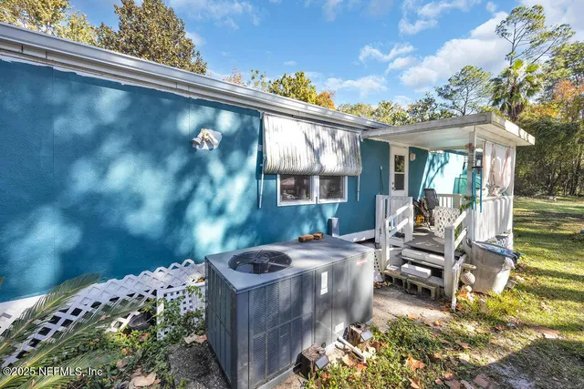 a bathroom with a sink toilet and mirror