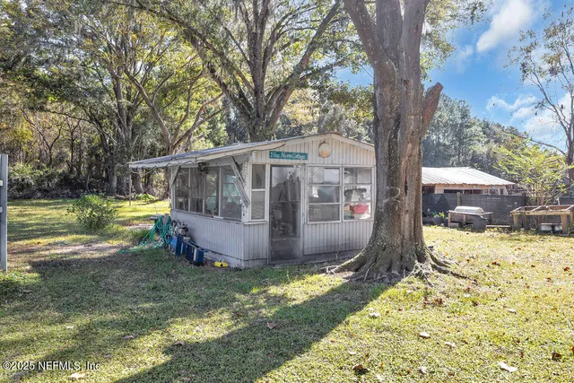 a bathroom with a sink mirror vanity and toilet
