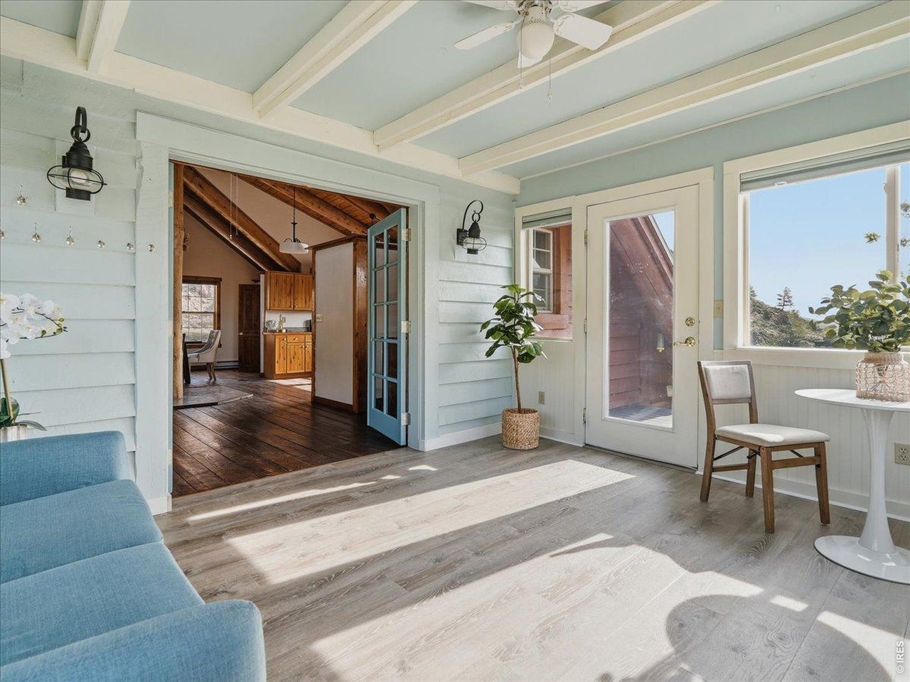 1652 Eiger Road Livermore, CO 80536 - Photo 17 of 50 Watch the sunrise or sunset from your sunroom with your coffee in hand all cozied up inside. Views from East, South and West in the Sunroom.