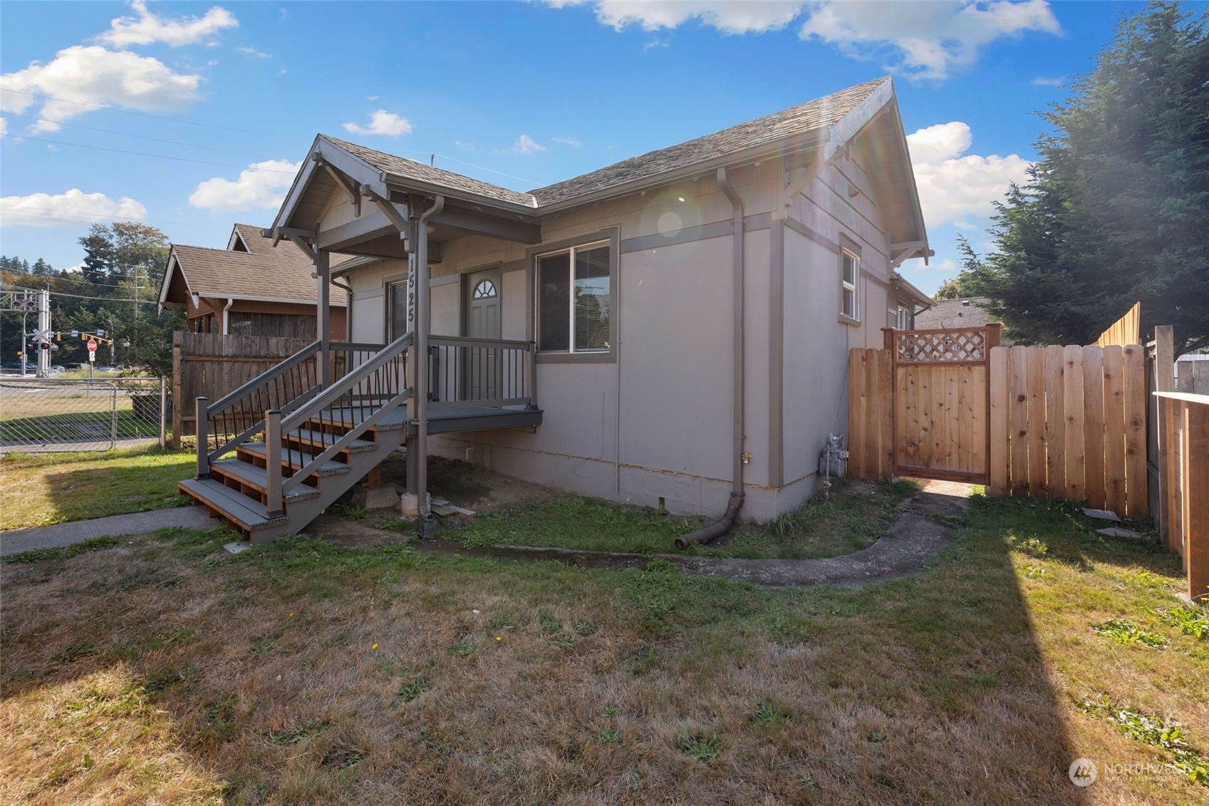 1525 North 3rd Street Renton, WA 98057 - Photo 36 of 38 a view of a house with a yard