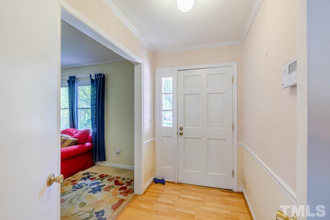 111 Larmack Court Durham, NC 27713 - Photo 12 of 24 a bedroom with a bed and a couch