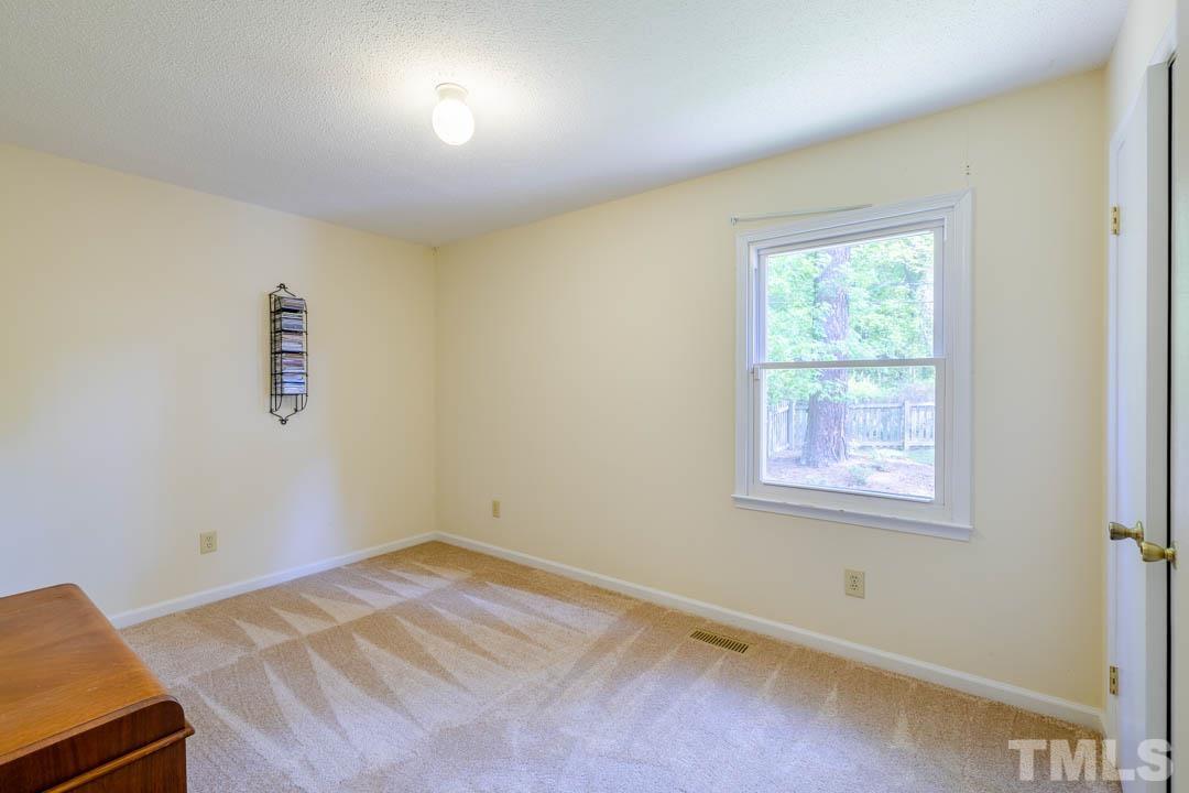 111 Larmack Court Durham, NC 27713 - Photo 13 of 24 an empty room with a window