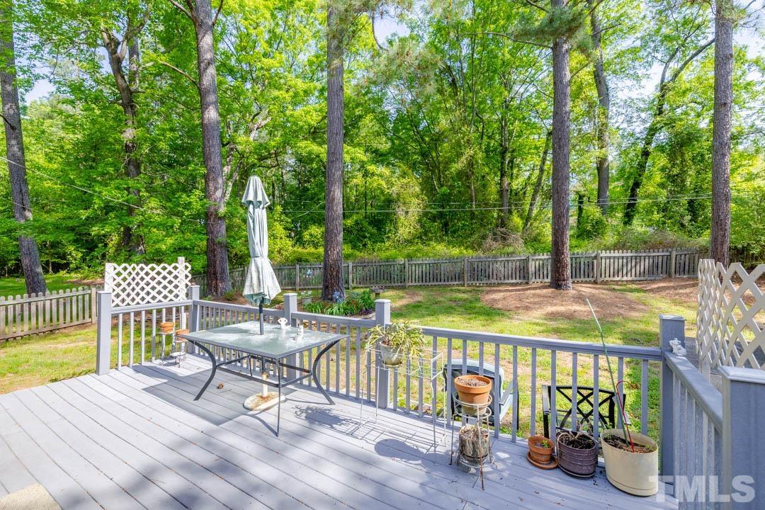 111 Larmack Court Durham, NC 27713 - Photo 19 of 24 a view of a swimming pool with a patio and a yard
