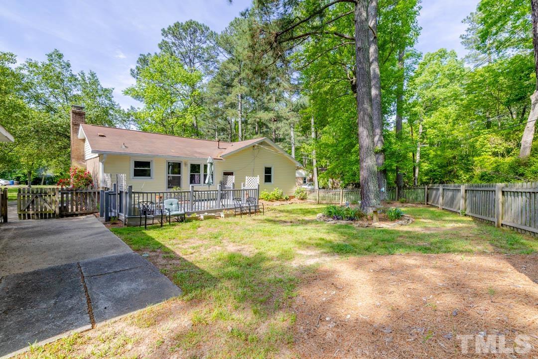 111 Larmack Court Durham, NC 27713 - Photo 21 of 24 a view of a house with backyard and sitting area