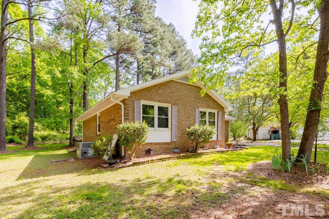 111 Larmack Court Durham, NC 27713 - Photo 23 of 24 a view of a house with yard and sitting area