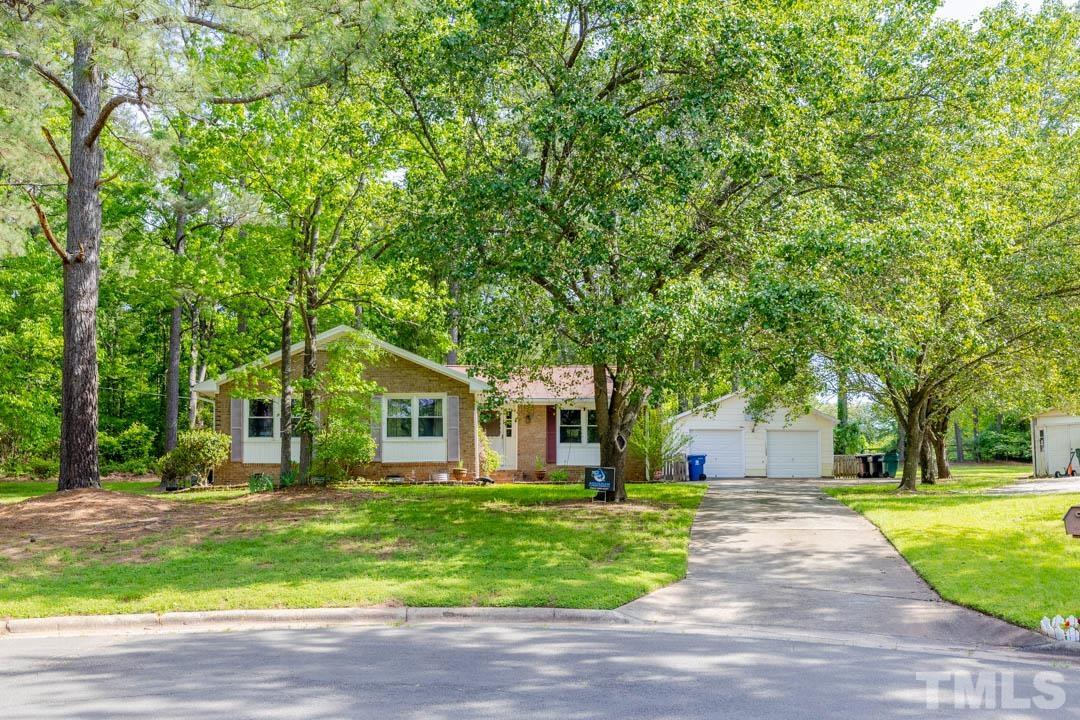 111 Larmack Court Durham, NC 27713 - Photo 4 of 24 a front view of a house with a yard