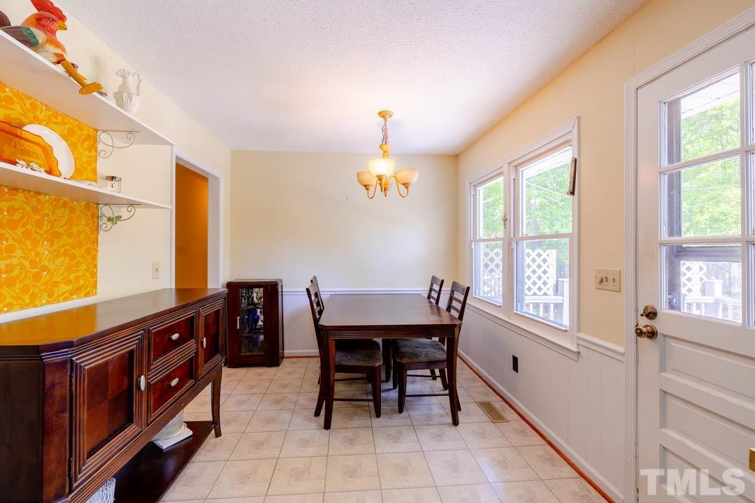 111 Larmack Court Durham, NC 27713 - Photo 9 of 24 a dining room with furniture and window
