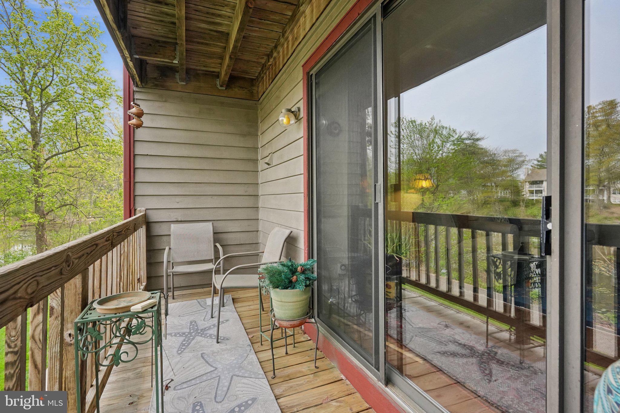 3303A Chadbury Road Mount Laurel, NJ 08054 - Photo 11 of 35 a view of a porch with wooden floor