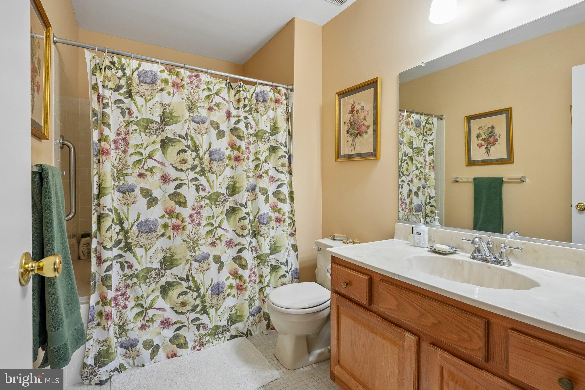 3303A Chadbury Road Mount Laurel, NJ 08054 - Photo 17 of 35 a bathroom with a sink toilet a shower and a mirror