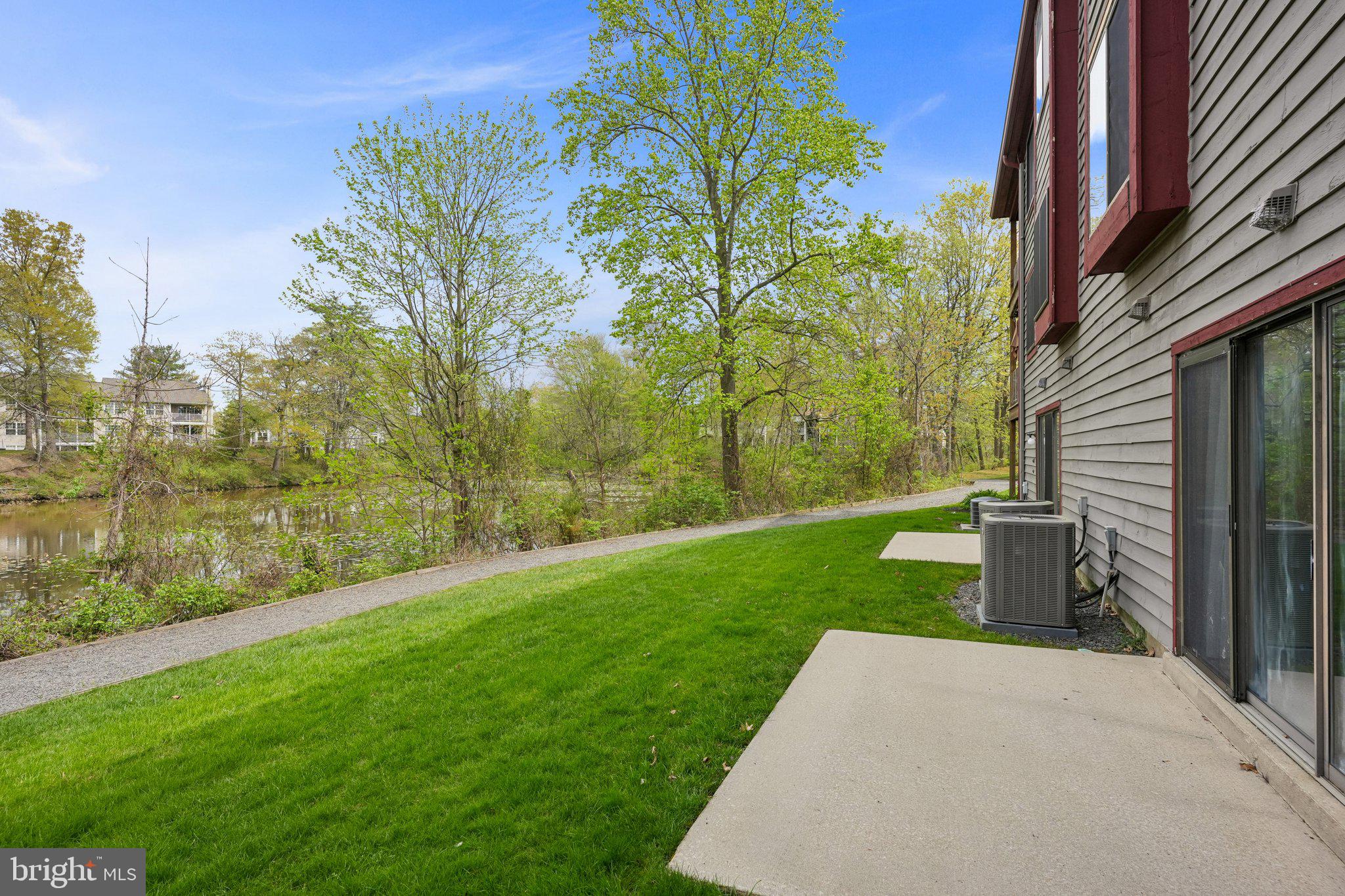 3303A Chadbury Road Mount Laurel, NJ 08054 - Photo 2 of 35 a view of a house with a yard and pathway