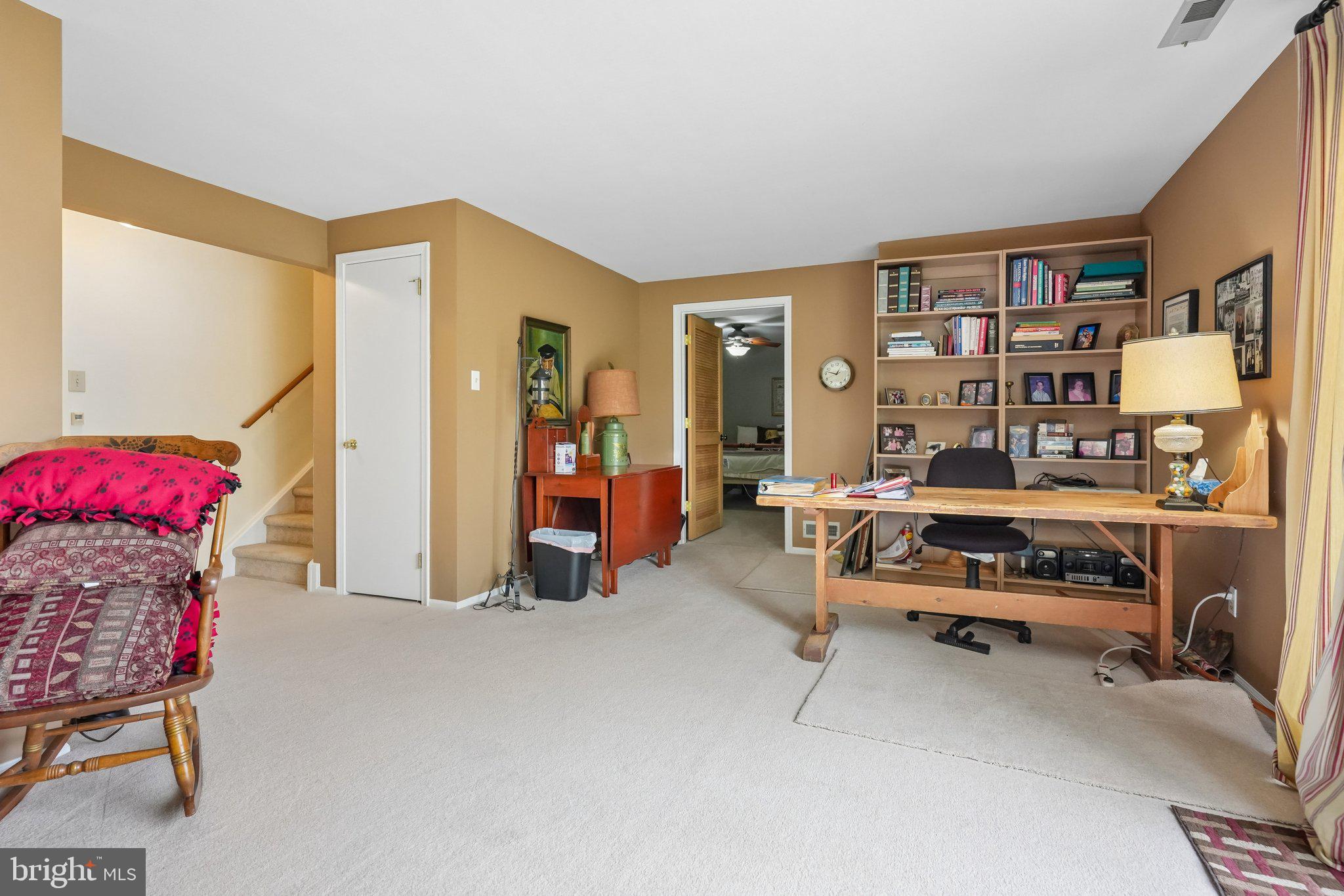 3303A Chadbury Road Mount Laurel, NJ 08054 - Photo 22 of 35 a bedroom with furniture and a book shelf