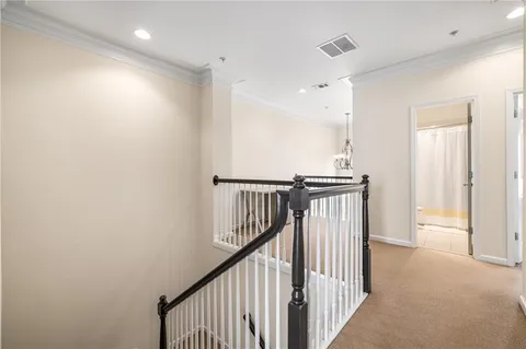 a view of an entryway with a hallway