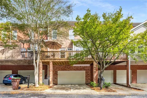 an aerial view of a house with a garden