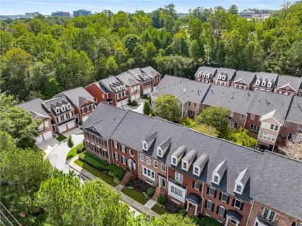 an aerial view of a house with a garden
