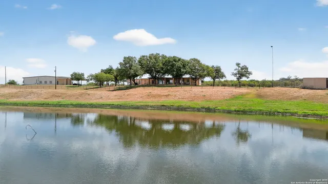a view of lake with green space