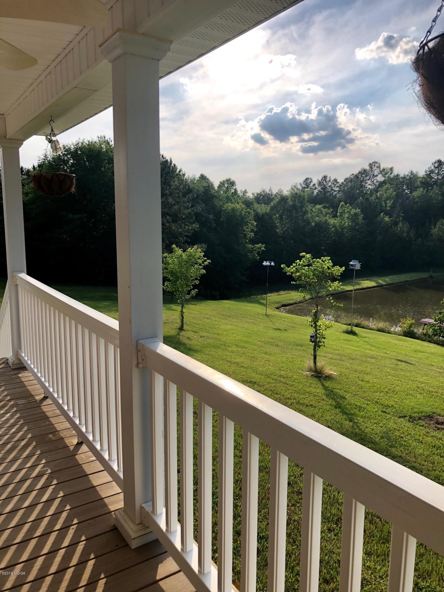 445 Childs Road Roberta, GA 31078 - Photo 20 of 23 a view of a balcony with a yard