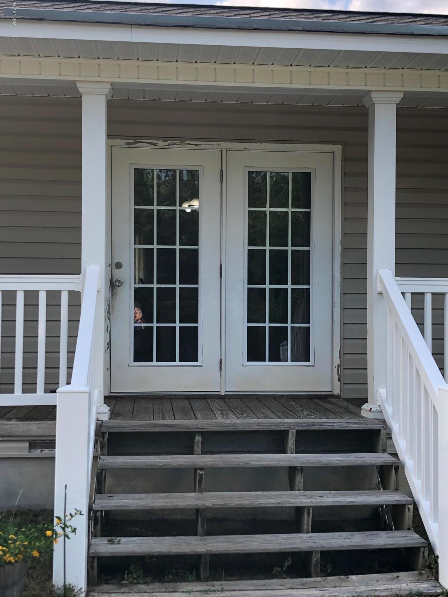 445 Childs Road Roberta, GA 31078 - Photo 22 of 23 a front view of a house with windows