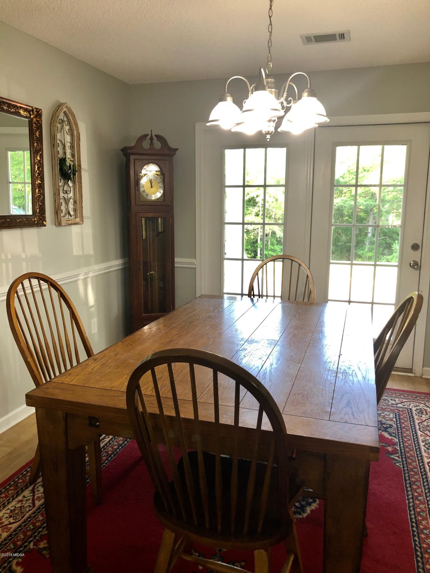 445 Childs Road Roberta, GA 31078 - Photo 5 of 23 a view of a dining room with furniture window and outside view