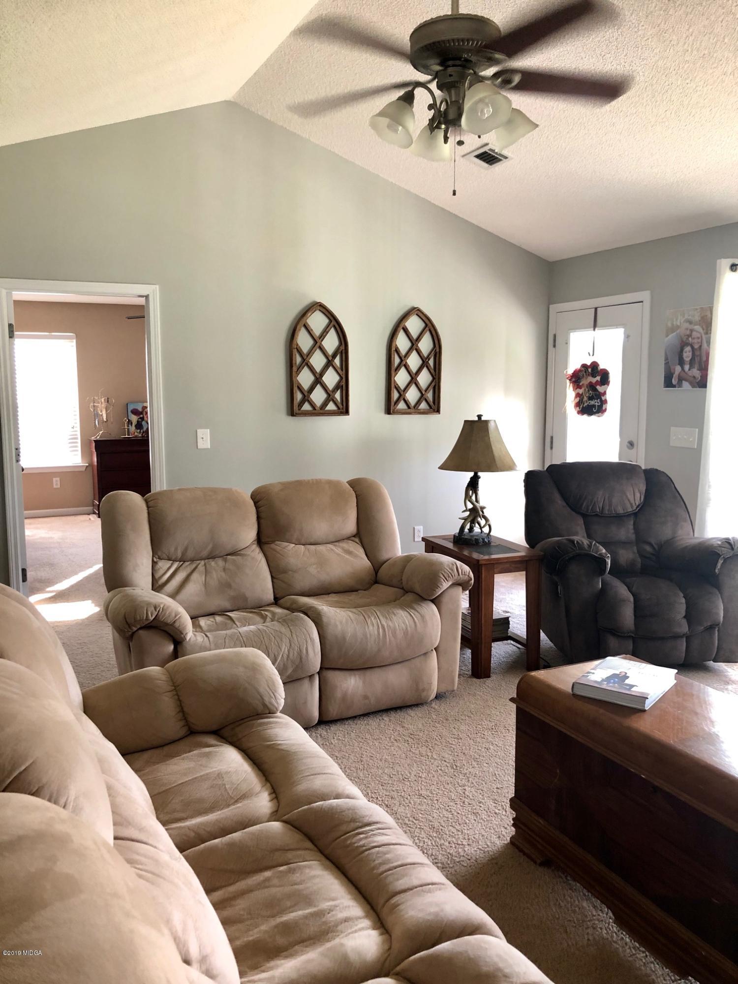 445 Childs Road Roberta, GA 31078 - Photo 7 of 23 a living room with furniture and a ceiling fan