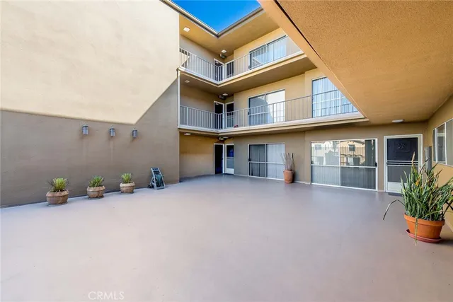 a view of a house with sitting area and furniture