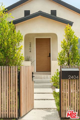 a front view of a house with a garage