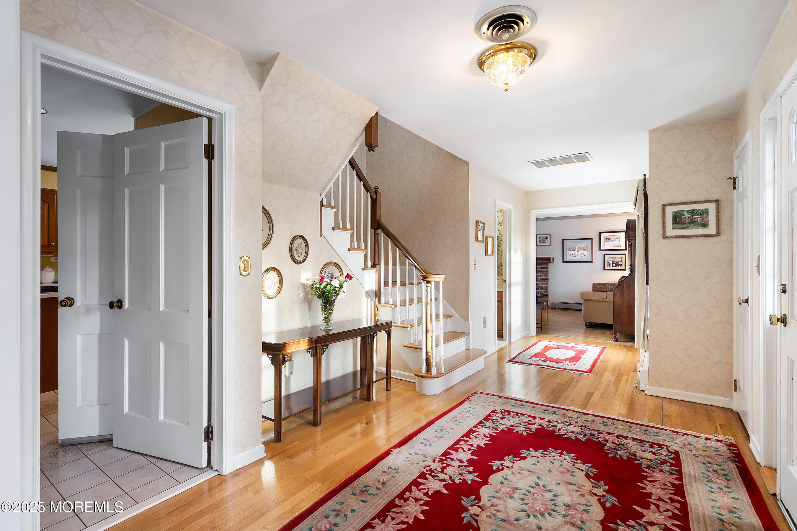 648 Valley Road Brielle, NJ 08730 - Photo 22 of 50 26-Foyer to Kitchen and Family